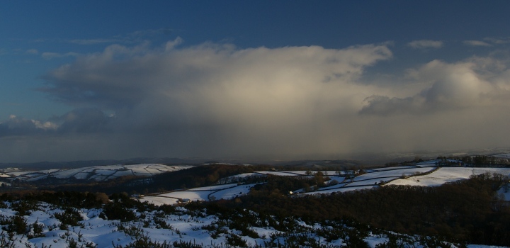A retreating snow shower on the edge of Dartmoor.