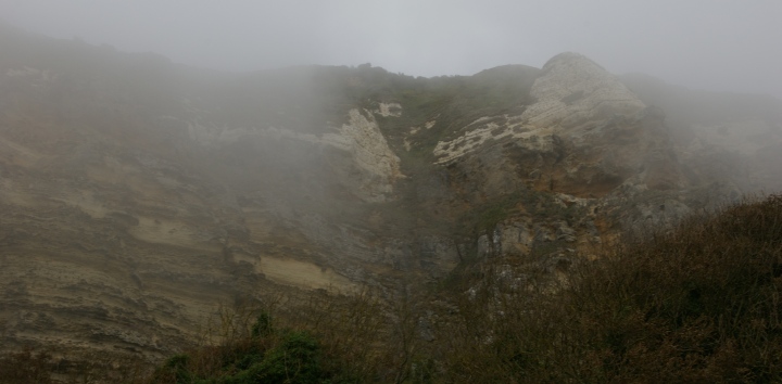 The misty cliffs at Branscombe on a day with a warm and humid maritime tropical air.